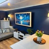 Photo 2: Living area with big screen tv