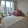 Photo 2: Living room and balcony