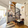 Photo 3: Staircase to upper floor leading to living and kitchen 