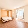 Photo 2: Living area& Bed 