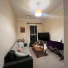 Photo 2: Lounge area with wardrobe space for tenant