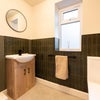 Photo 11: Shared bathroom
