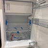 Photo 7: Decent sized under counter fridge with an ice box
