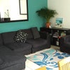 Photo 3: Spacious living area with access to back garden and garage