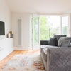Photo 5: TV area, light and airy
