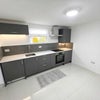 Photo 5: Kitchen with brand new appliances / Storage cabinets 