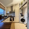 Photo 3: Kitchen with dishwasher and washing machine
