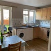 Photo 3: The shared kitchen faces the garden