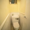 Photo 5: The toilet with washing unit on top