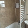 Photo 6: Bathroom 1 with Bath and toilet