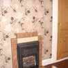 Photo 3: original feature fireplace & storage