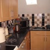 Photo 4: contemporary neat kitchen