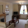 Photo 2: Large TV / Dining Lounge