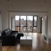 Photo 2: Open plan living and dining area