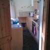 Photo 9: Kitchen with back door to patio