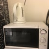 Photo 5: Microwave, fridge, kettle in room