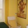 Photo 3: Easy chair at end of bed