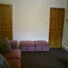 Photo 2: living room with entrance to cellar (dry)
