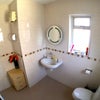 Photo 2: Two Bathrooms with High Pressure Shower
