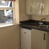 Photo 3: Kitchen with fridge freezer