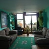 Photo 1: shared sitting/dining  room