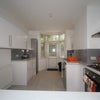Photo 5: Beautiful New Kitchen with Doors Opening onto the Garden