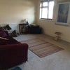 Photo 2: Front room with tv