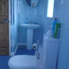 Photo 4: Toilet, wash basin and mirror
