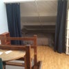 Photo 3: The bed area of the room 