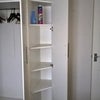 Photo 5: double wardrobe with single cupboard shelves