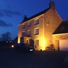 Photo 7: The house at night