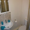 Photo 8: Quality modern ensuite with mirror cabinet, chrome towel radiator & elec point,