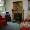 Photo 6: Lounge with wood burner