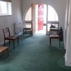 Photo 8: dinning area, table not in, as in store?