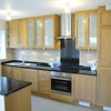 Photo 3: New kitchen with integrated applicances, including 2 fridges, built in dishwasher, halogen hob, oven