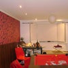 Photo 3: Living space with 50in TV and dinning/pool table