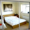 Photo 5: The bedroom with double bed and huge sliding wardrobes and built in desk.