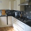 Photo 2: Large and well equipped kitchen
