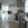 Photo 1: Modern kitchen with all appliances