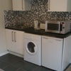 Photo 5: Kitchen Area