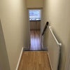 Photo 4: Down into the kitchen from the hall