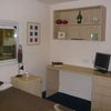 Photo 2: A typical bedroom. Bedroom includes en-suite bathroom.