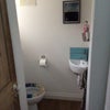 Photo 6: Downstairs toilet and shower