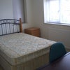 Photo 4: spare double room with desk, chair, wardrobe and ensuite
