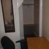 Photo 2: walk in wardrobe/storage space