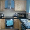 Photo 3: Equipped kitchen, fridge/freezer, dishwasher, washing machine, leading into conservatory/dining room