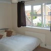 Photo 4: Double room with built in hanging and storage area and bookcase