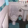 Photo 3: view of toilet/bath