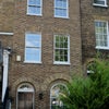 Photo 7: front of house from the street
