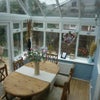 Photo 7: Conservatory looking out to 60ft rear garden with patio